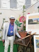 Alan Roper with one of the  Sir Isaac Newton Apple saplings
