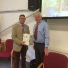 Tony Blake presents gift to Sam Bosworth outgoing Chairman