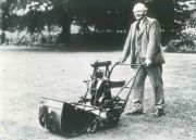 Charles H Pugh with a 1921 ATCO Standard, the world's first successfully mass produced lawnmower